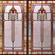 Antique American Arts & Crafts stained glass window with stylized floral and leaf motif, catalog AE384